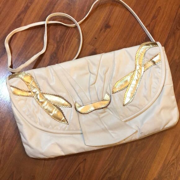 Vintage Handbags - Vintage White and gold leather clutch purse with straps.